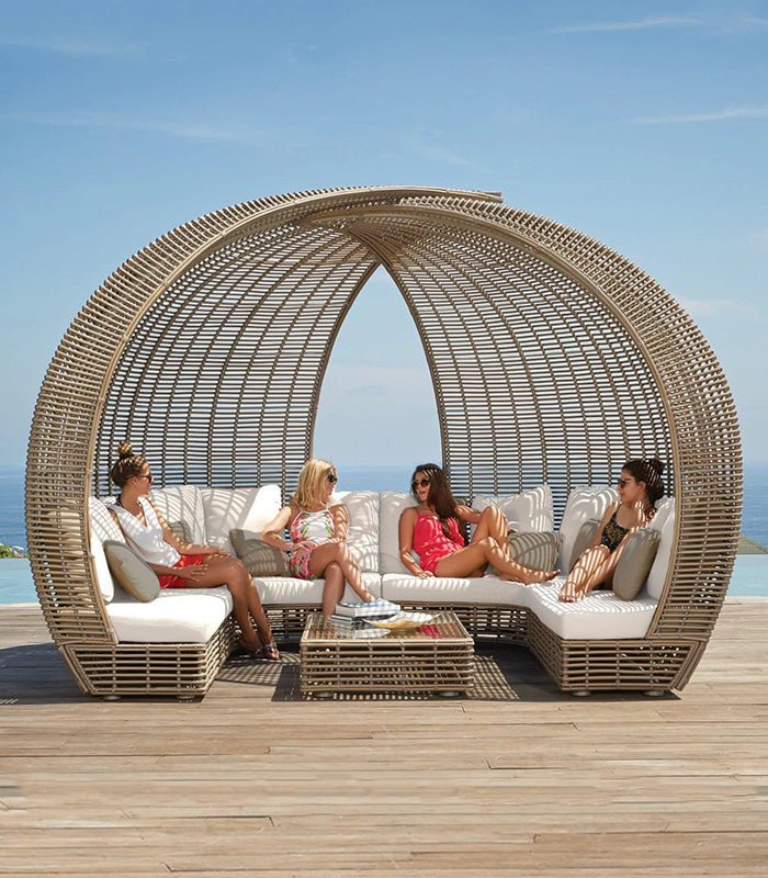 Plush Cushions & Coffee Table Convenience: Modern Outdoor Wicker Daybed Set - North Oasis